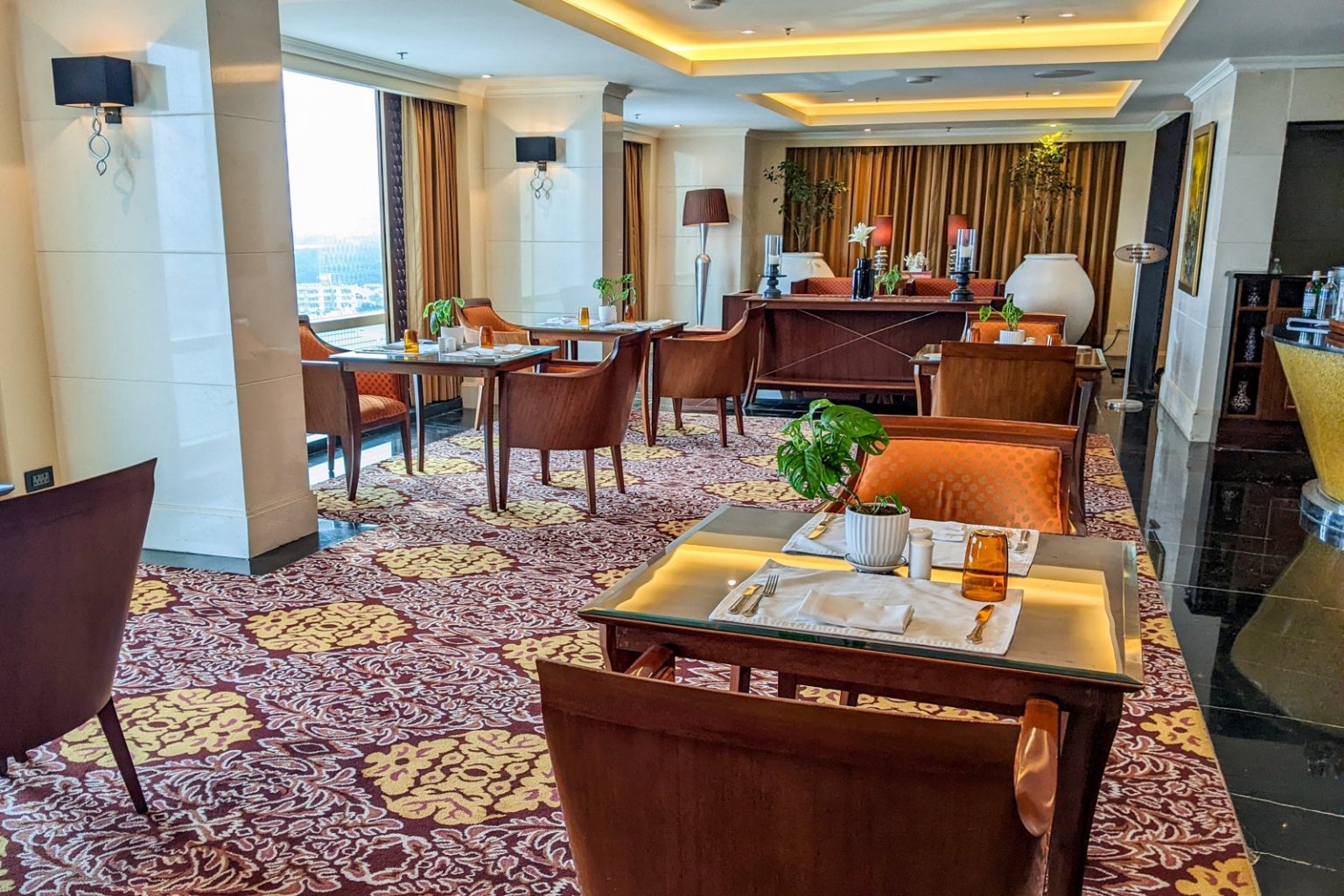 What is a hotel club lounge, and how do you get access?